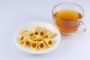 Pineapple pie with tea isolated on white background