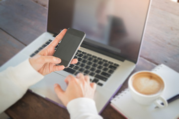 Woman surfing the internet with wireless gadget