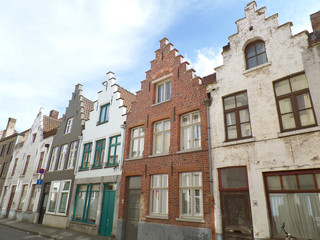 Fototapeta na wymiar Brown and white tone vintage bricked buildings in Bruges, Belgium 