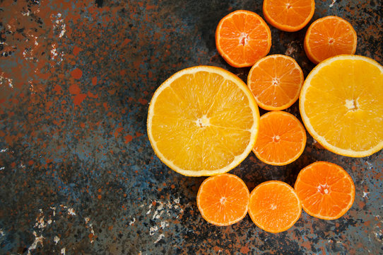 Citrus fruits composition on rusty background