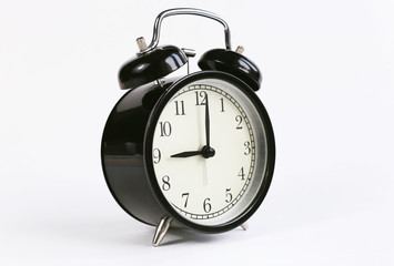 classic table clock on a white background. decor element
