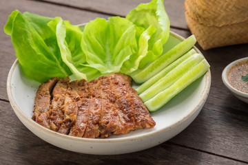 Grilled pork with vegetable on plate