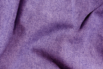 Purple color denim cloth texture.