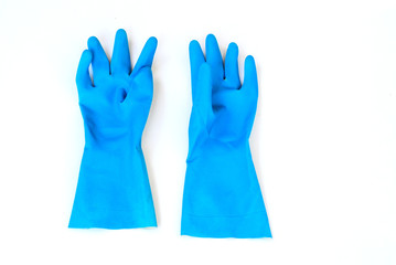 Obraz premium Blue plastic gloves on white background. 