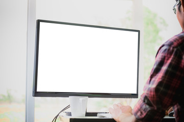 Man looks at the screen computer.