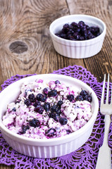 Obraz na płótnie Canvas Healthy food: cottage cheese with frozen blueberries