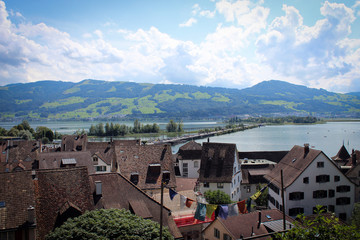 Fototapeta na wymiar Roofs of Rapperswil and Rapperswil harbour of Lake Zurich, Switzerland 