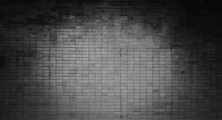 Grey textured wall, dark edges