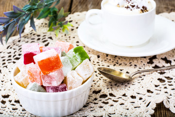 Eastern dessert Turkish delight and coffee with cream