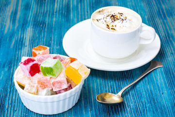 Eastern dessert Turkish delight and coffee with cream