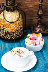 Eastern dessert Turkish delight and coffee with cream