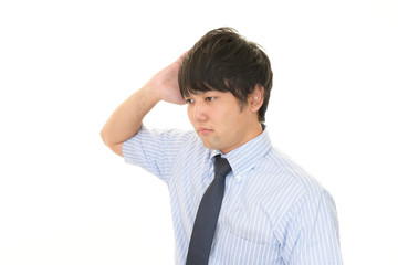 苦悩するビジネスマン