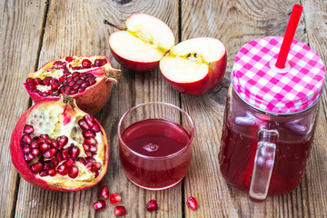 Natural juice of pomegranate and red apples