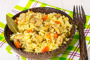 Rice with carrots, chicken and spices