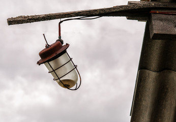 Long ago extinguished the electric lantern.