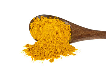 Turmeric powder in wooden spoon on a white background. Curcuma p