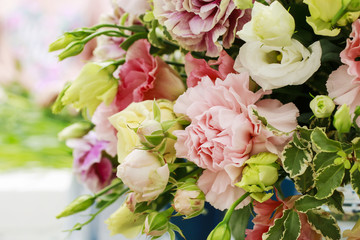 Floral arrangement with carnation, eustoma and hortensia flowers