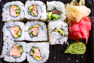 Set of futomaki sushi with grilled salmon