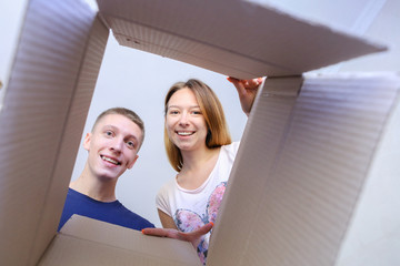 Couple of Man And Woman Opened Box, Looked Inside Box, Happy, Ex