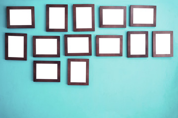 Photo frames on the colorful wall