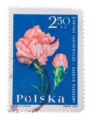 Poland - about 1964: stamp seal in  shows standard carnati