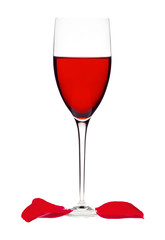 Classic Glass of Red Wine and rose petals isolated on a white ba