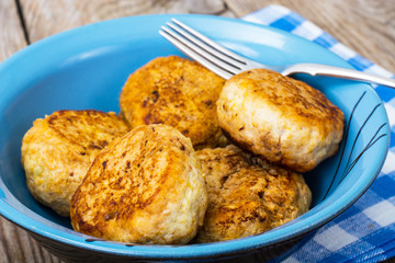 Cutlets in a ceramic bowl