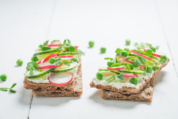Tasty crispy bread with fromage cheese, avocado and crunchy bread