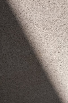 Dark and bright side of wall texture with shadow