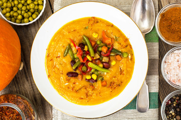 Spicy vegetable cream soup with vegetables