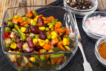 Stewed vegetables in a glass salad bowl