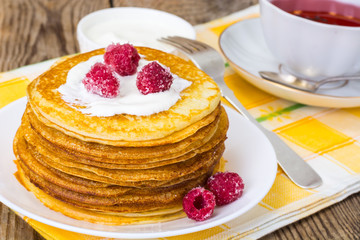 Lush and tender Pancake with berries in sugar