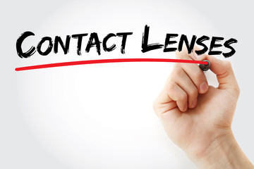 Hand writing Contact lenses with marker, health concept background