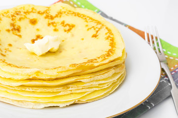 Delicious pancakes on a white background