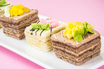 Sweets Cream Cakes on Plate