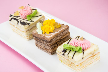 Sweets Cream Cakes on Plate