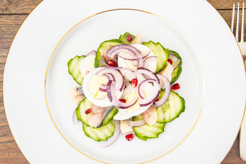 Dietary Food: Salad with Herring, Cucumber, Egg and Onion