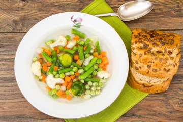 Soup with Cauliflower, Brussels Sprouts, Green Beans, Peas, Carr