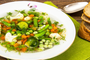 Soup with Cauliflower, Brussels Sprouts, Green Beans, Peas, Carr