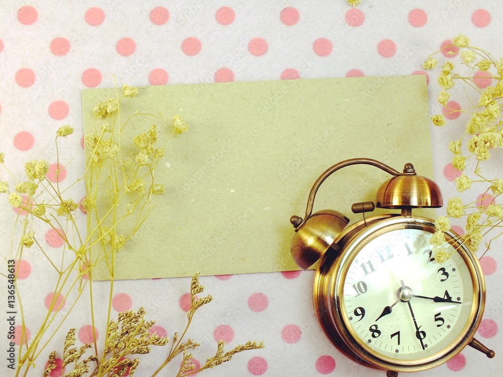 Wall mural clock with space backgroun with dried flower decorate