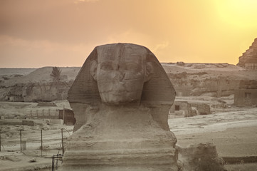 Naklejka na ściany i meble The Great Sphinx of Giza on a sunset background, Egypt