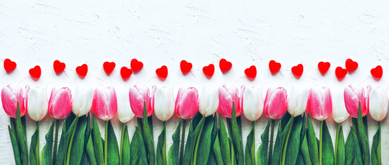 Spring tulips flowers with many hearts