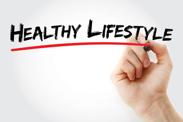 Hand writing Healthy lifestyle with marker, health concept background