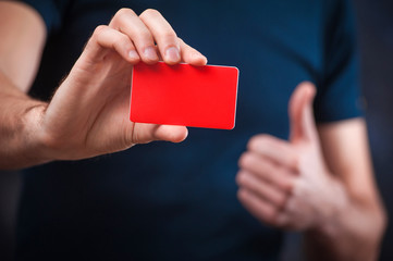 Young funny man with business card for the holiday 03