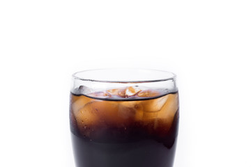 Ice cola with splashing, bubbles. Drink with ice.