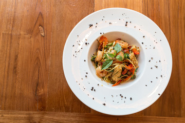 spaghetti seafood mix with basil and herb