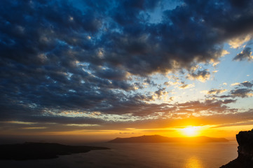 Fototapeta na wymiar Sunset at Santorini, Greece. View to caldera sea.