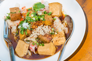 Rich noodle paste with bean sprout and steamed Tofu