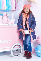 Beautiful cute pretty little girl baby blond curly hair fun play
