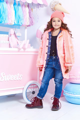 Beautiful cute pretty little girl baby blond curly hair fun play